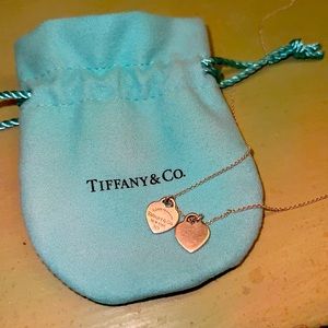 Authentic Tiffany & Co mini double heart tag pendant in sterling silver